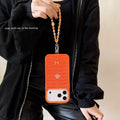Hermès Horse Art Orange Designer iPhone Case with Wrist Chain Descript