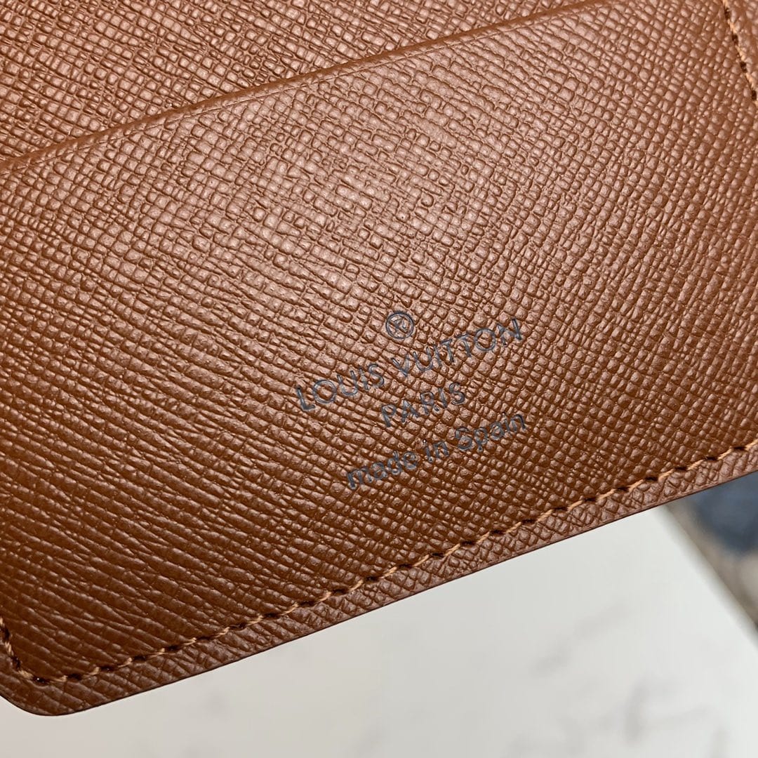 HypedEffects Brown louis vuitton Monogram Passport Holder