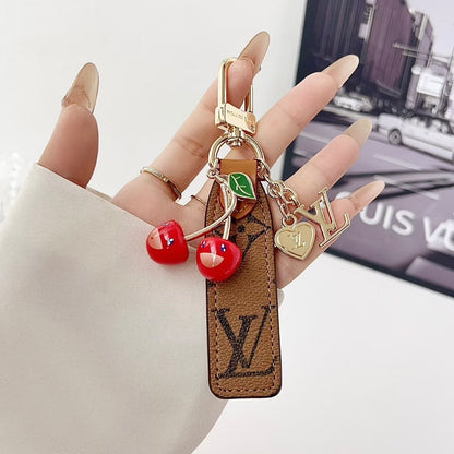 HypedEffects louis vuitton Cherry Charm Keychain with Monogram Leather Strap Luxury Designer Bag and Key Accessory