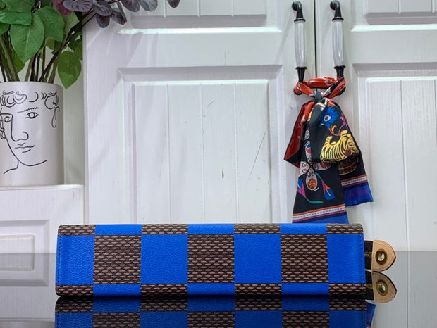 HypedEffects Louis Vuitton Damier Graphite Pochette Voyage MM with Royal Blue Accents