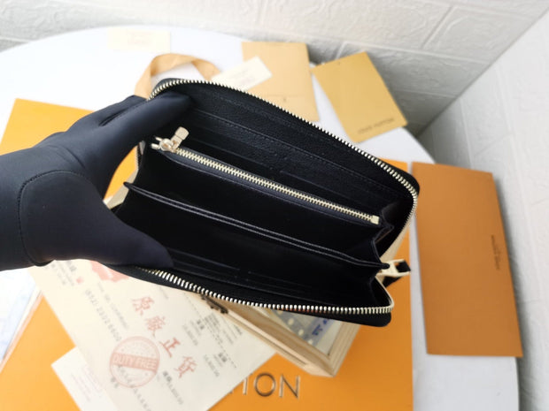 HypedEffects Louis Vuitton Leather Zipper Wallet