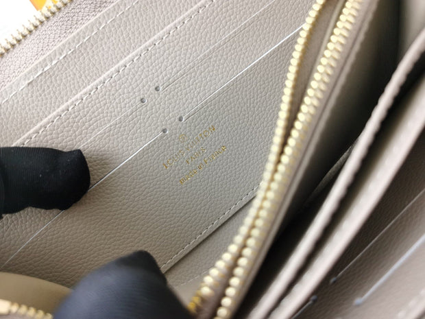 HypedEffects Louis Vuitton Leather Zipper Wallet