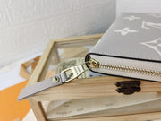 HypedEffects Louis Vuitton Leather Zipper Wallet