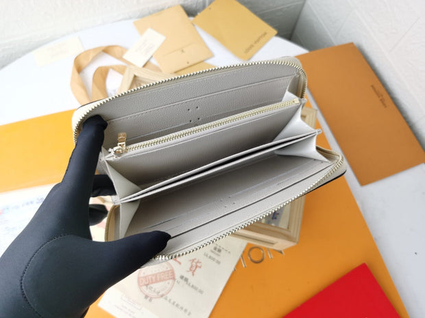 HypedEffects Louis Vuitton Leather Zipper Wallet