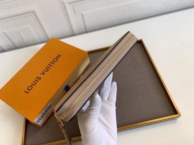 HypedEffects Louis Vuitton Leather Zipper Wallet