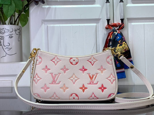 HypedEffects Louis Vuitton Monogram Embossed Leather Handbag in Blush with Gold-Tone Hardware