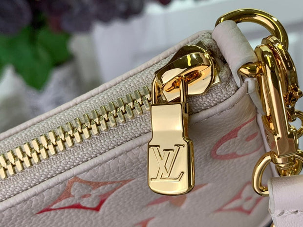 HypedEffects Louis Vuitton Monogram Embossed Leather Handbag in Blush with Gold-Tone Hardware