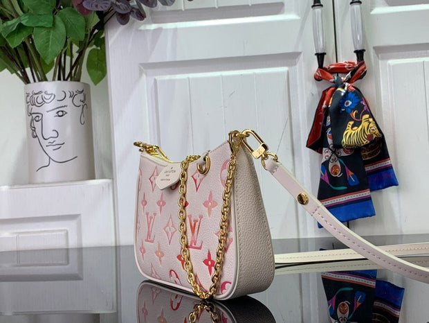 HypedEffects Louis Vuitton Monogram Embossed Leather Handbag in Blush with Gold-Tone Hardware
