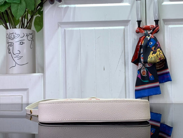 HypedEffects Louis Vuitton Monogram Embossed Leather Handbag in Blush with Gold-Tone Hardware