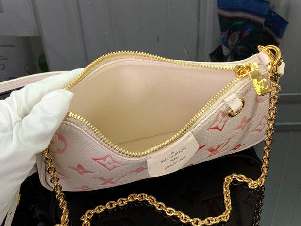 HypedEffects Louis Vuitton Monogram Embossed Leather Handbag in Blush with Gold-Tone Hardware