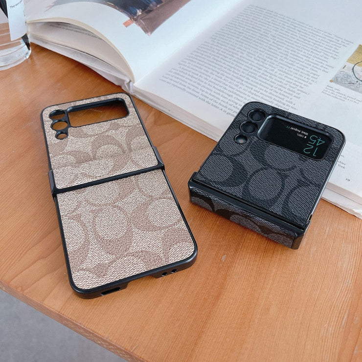 Looopix Coach Z Flip Samsung Phone Case with Finger Strap