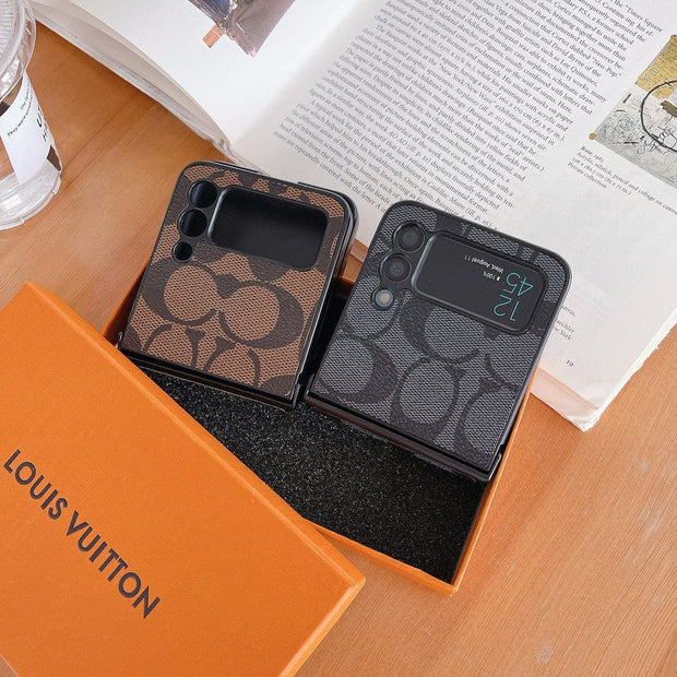Looopix Coach Z Flip Samsung Phone Case with Finger Strap