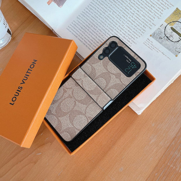 Looopix Coach Z Flip Samsung Phone Case with Finger Strap