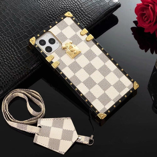Looopix Louis Vuitton Checkered Trunk-Inspired iPhone Cases with Gold Hardware