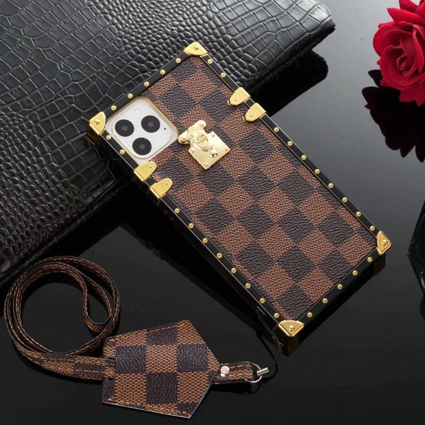 Looopix Louis Vuitton Checkered Trunk-Inspired iPhone Cases with Gold Hardware