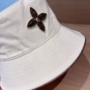 Looopix Louis Vuitton Monogram Bucket Hat with Floral Appliqué