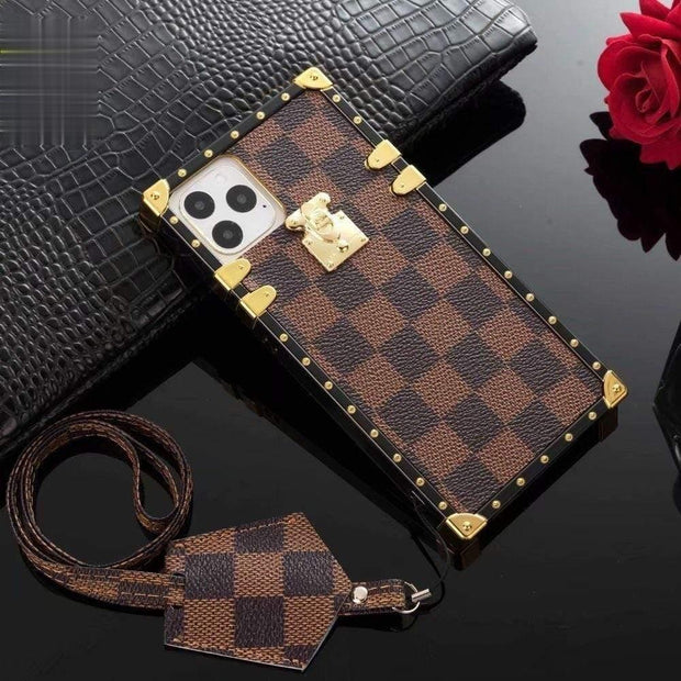 Looopix Louis Vuitton Trunk-Style Monogram iPhone 15 Cases with Gold Hardware